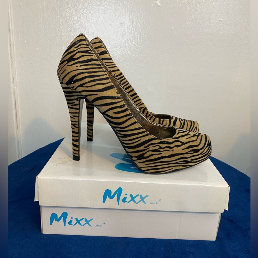 Brand new platform heels. Tiger print.